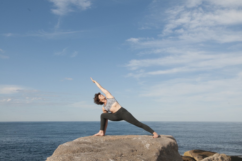 Lyengar ® Yoga Instructor Demonstrates U. Parsvakonasana (Standing).